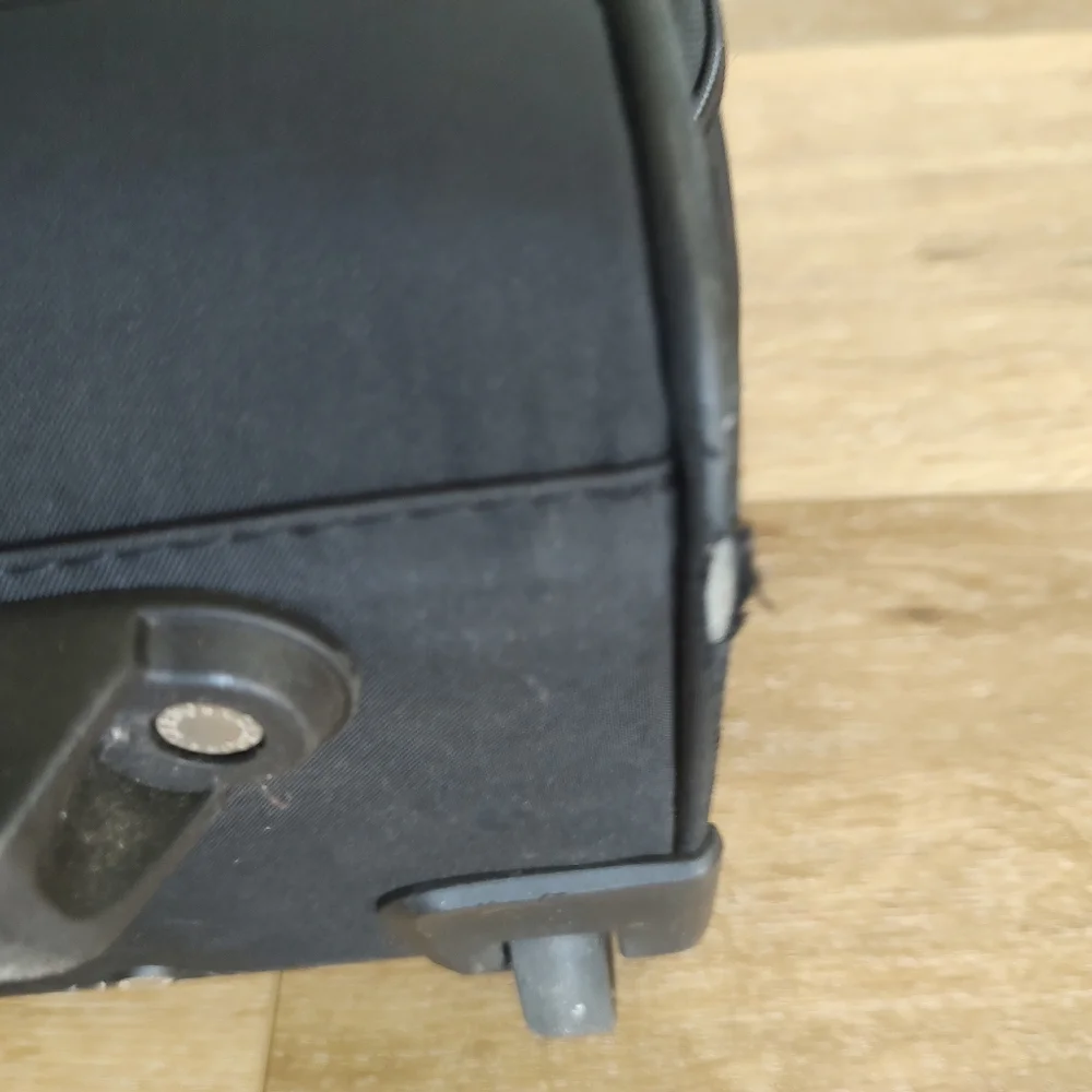 Ricardo Beverly Hills Black Carry-on Under Seat Roller Bag Black